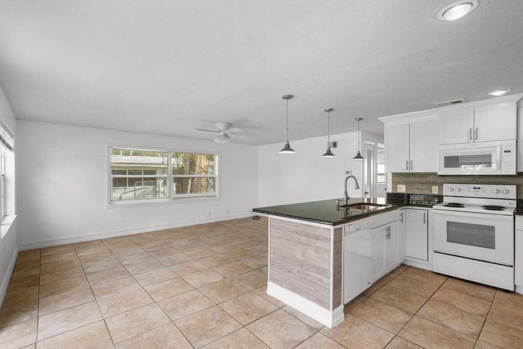 Photo of 1048 SW 30th Street, Palm City, FL 34990 (MLS # RX-10955880)