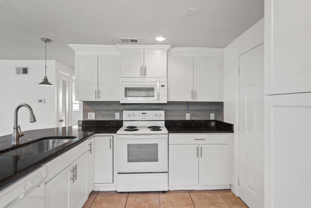 Photo of 1048 SW 30th Street, Palm City, FL 34990 (MLS # RX-10955880)