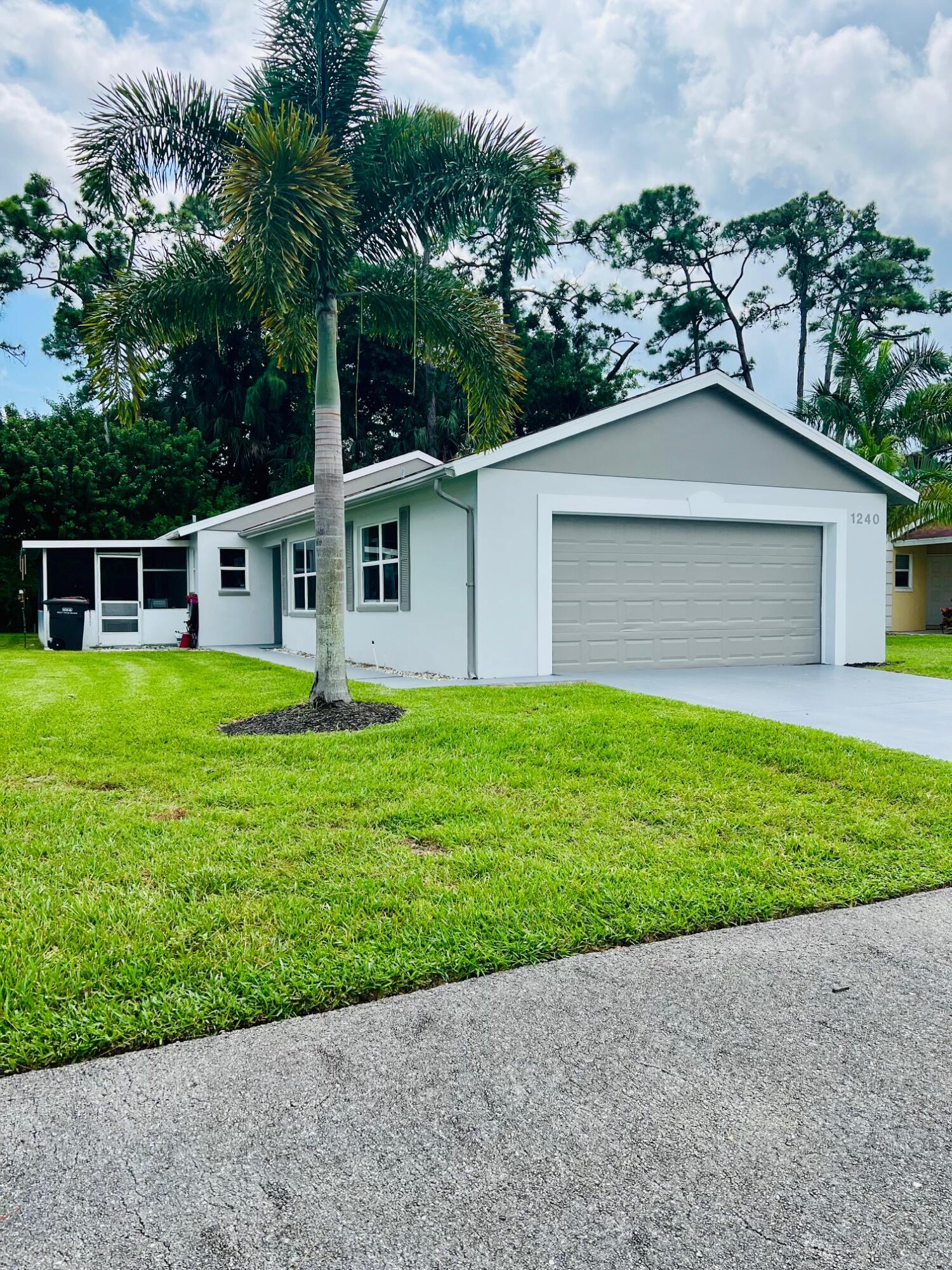 1240 Pine Sage Circle, West Palm Beach, Palm Beach County, Florida - 3 Bedrooms  
2 Bathrooms - 