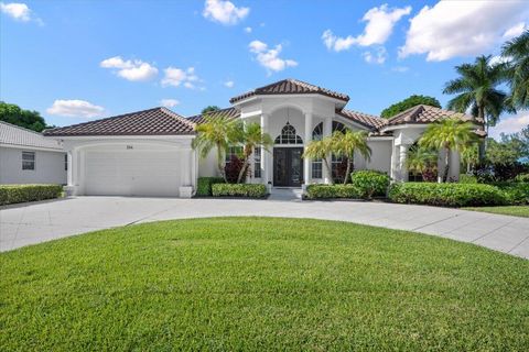 Photo of 244 Cypress Trace, Royal Palm Beach, FL 33411 (MLS # RX-11117927)