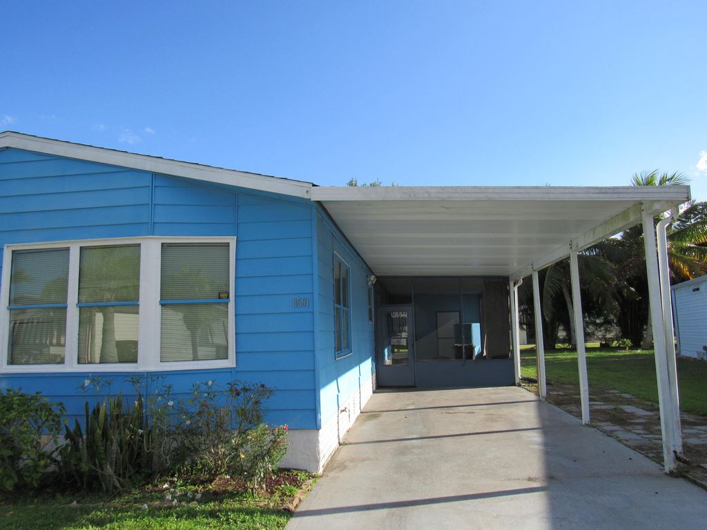 Photo of 8591 Mary Ann Lane, Port Saint Lucie, FL 34952 (MLS # RX-11124534)