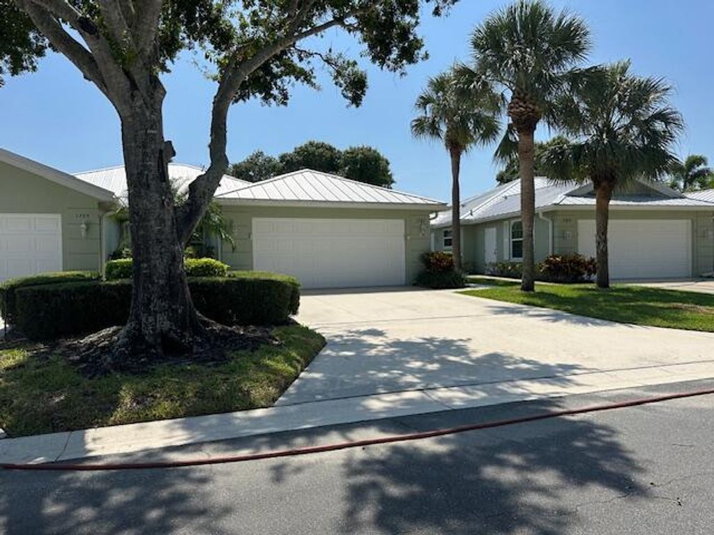 Photo of 1787 SW Waterfall Boulevard, Palm City, FL 34990 (MLS # RX-11093416)