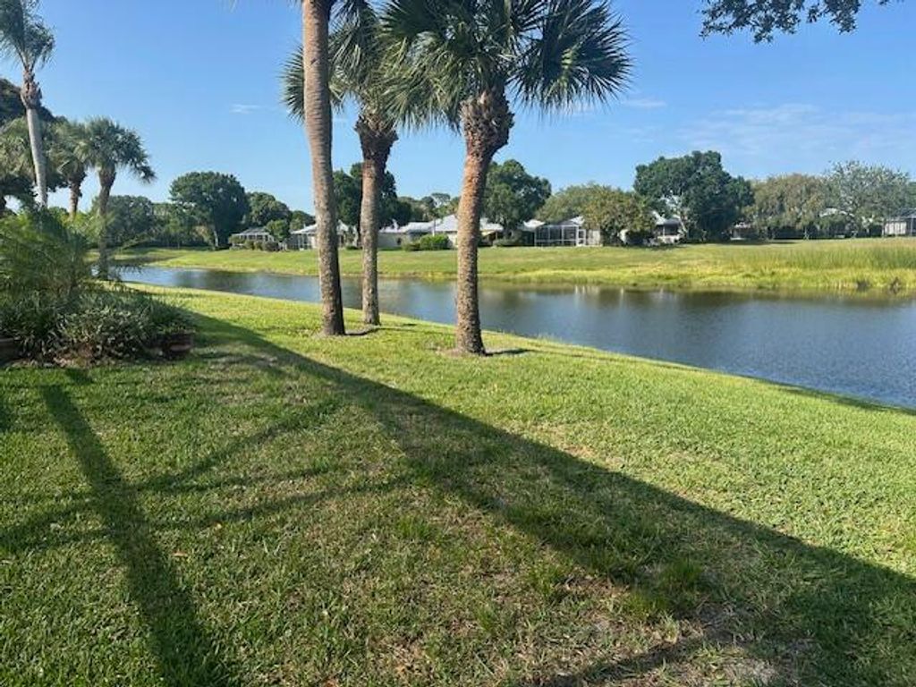 Photo of 1787 SW Waterfall Boulevard, Palm City, FL 34990 (MLS # RX-11093416)
