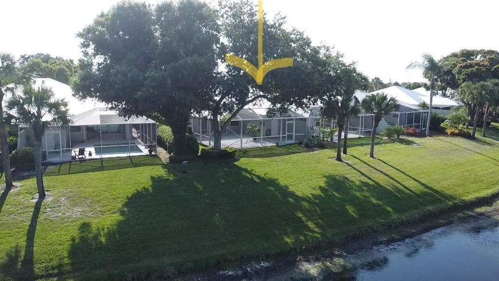 Photo of 1787 SW Waterfall Boulevard, Palm City, FL 34990 (MLS # RX-11093416)