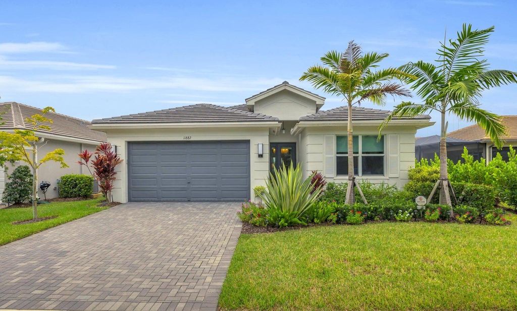Photo of 11882 SW Oceanus Boulevard, Port Saint Lucie, FL 34987 (MLS # RX-11125203)
