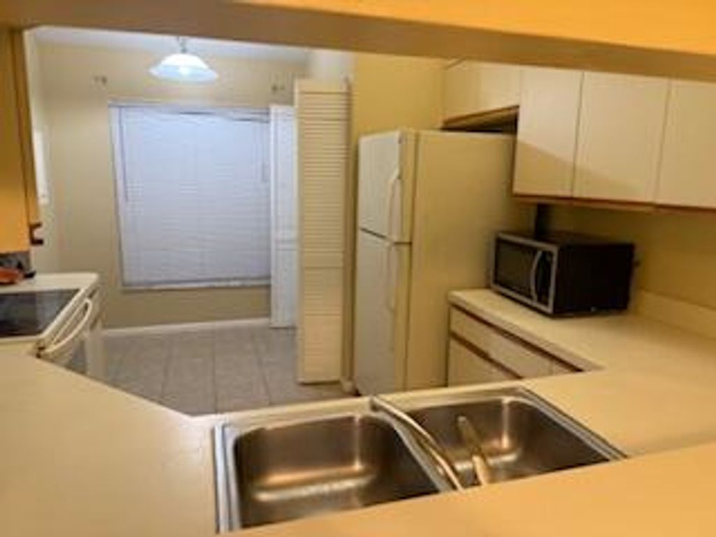 Photo of 6531 SE Federal Highway #H1-201, Stuart, FL 34997 (MLS # RX-11123320)