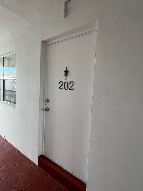Photo of 1321 NW 43rd Avenue #202, Lauderhill, FL 33313 (MLS # RX-11129704)