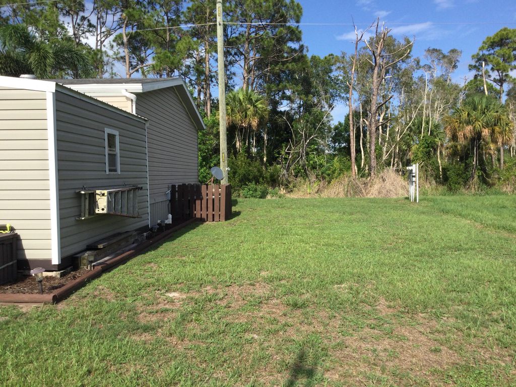 Photo of 83 Spanish Way, Port Saint Lucie, FL 34952 (MLS # RX-11096453)