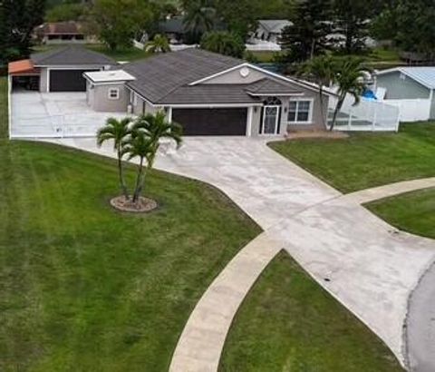 Photo of 183 Cordoba Circle, Royal Palm Beach, FL 33411 (MLS # RX-11109641)