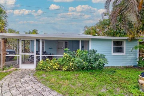 Photo of 866 SW 29th Terrace #Main House, Palm City, FL 34990 (MLS # RX-11125589)