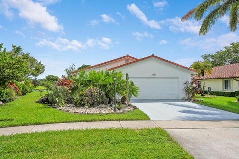 Photo of 8421 Bonita Isle Drive, Lake Worth, FL 33467 (MLS # RX-11128716)