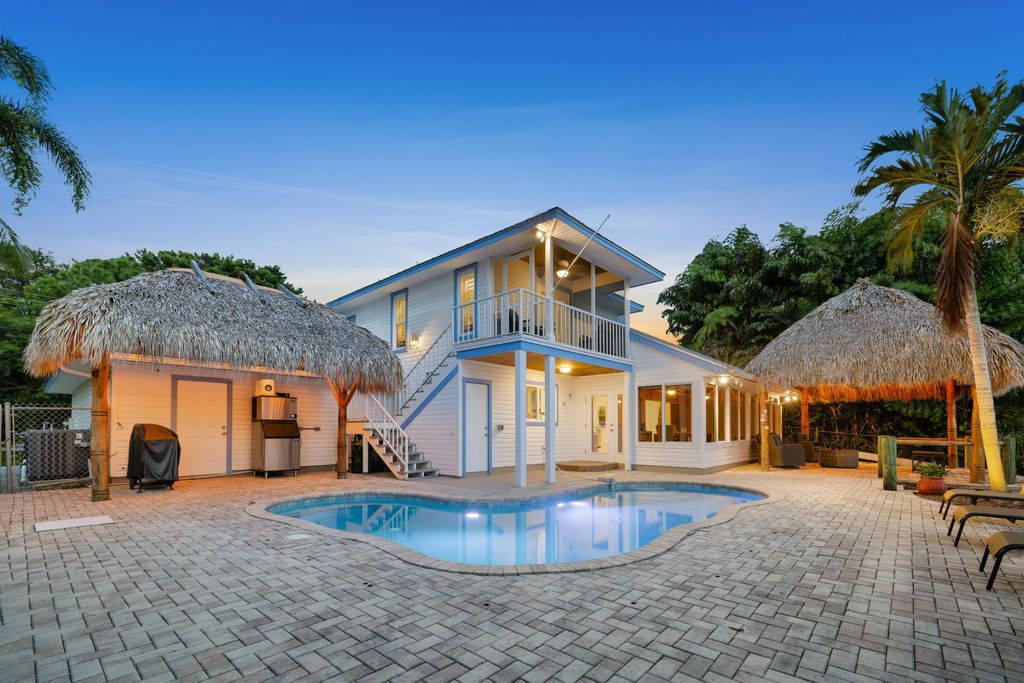 Photo of 1359 SW Dyer Point Road, Palm City, FL 34990 (MLS # RX-11082244)