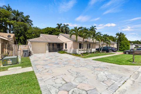 Photo of 21665 Sutters Lane, Boca Raton, FL 33428 (MLS # RX-11120491)