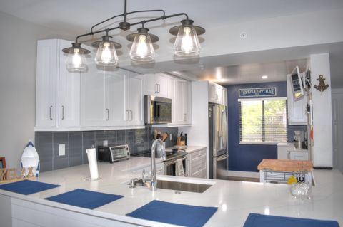 Photo of 1301 Seafarer 305 Circle #305, Jupiter, FL 33477 (MLS # RX-11113423)