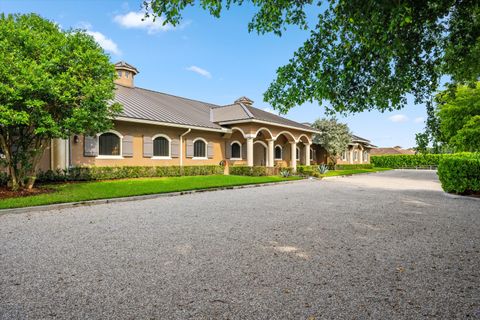 Photo of 3509 Grand Prix Farms Drive, Wellington, FL 33414 (MLS # RX-11123995)