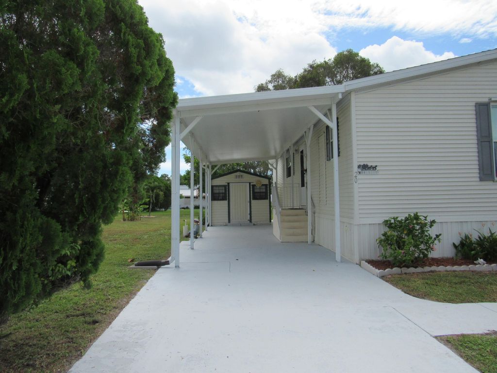 Photo of 20 Maya Way, Port Saint Lucie, FL 34952 (MLS # RX-11115916)