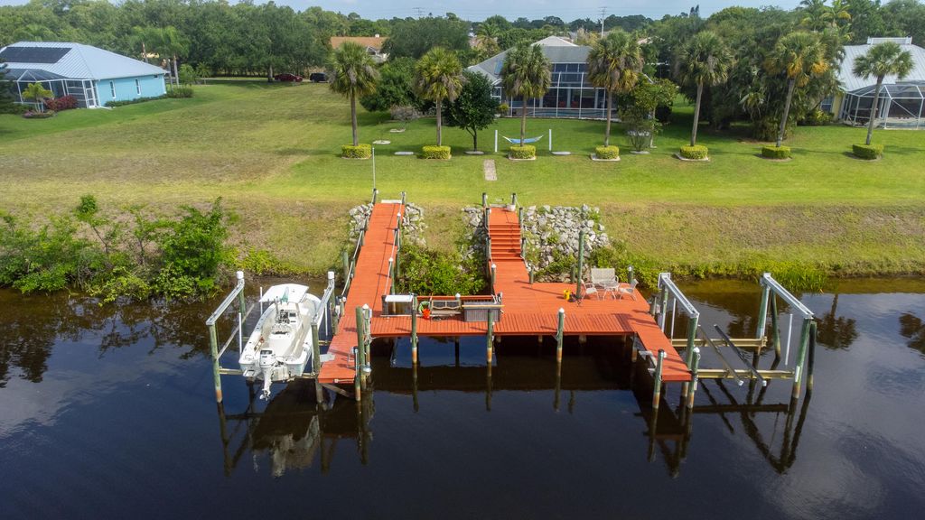 Photo of 2608 SW River Shore Drive, Port Saint Lucie, FL 34984 (MLS # RX-11095353)