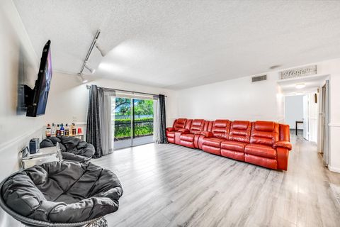 Tiny photo for 2717 S Oakland Forest Drive #102, Oakland Park, FL 33309 (MLS # RX-11107709)