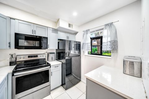 Tiny photo for 2717 S Oakland Forest Drive #102, Oakland Park, FL 33309 (MLS # RX-11107709)