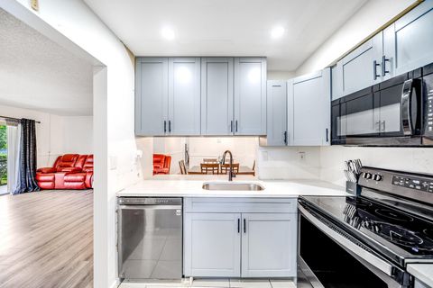 Tiny photo for 2717 S Oakland Forest Drive #102, Oakland Park, FL 33309 (MLS # RX-11107709)