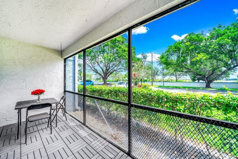 Tiny photo for 2717 S Oakland Forest Drive #102, Oakland Park, FL 33309 (MLS # RX-11107709)