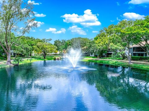 Tiny photo for 2717 S Oakland Forest Drive #102, Oakland Park, FL 33309 (MLS # RX-11107709)