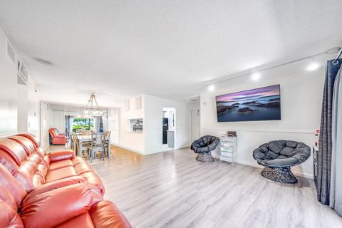 Tiny photo for 2717 S Oakland Forest Drive #102, Oakland Park, FL 33309 (MLS # RX-11107709)