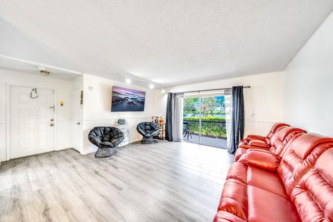 Tiny photo for 2717 S Oakland Forest Drive #102, Oakland Park, FL 33309 (MLS # RX-11107709)