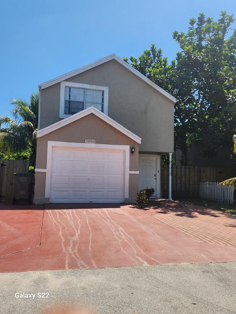 Photo of 5884 Dewberry Way, West Palm Beach, FL 33415 (MLS # RX-11125873)