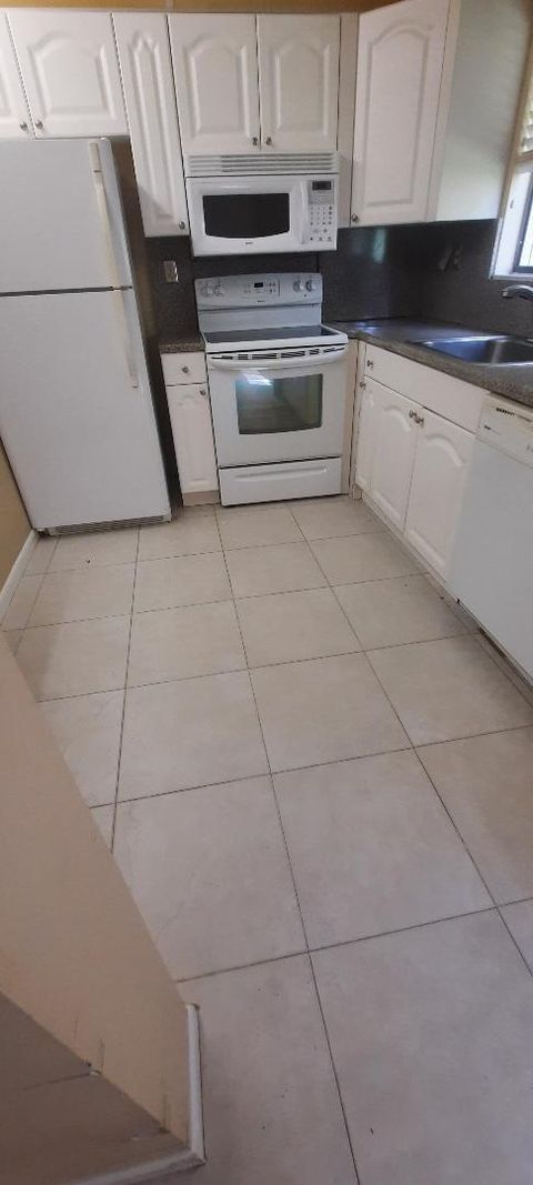 Photo of 15217 Lakes Of Delray Boulevard #90, Delray Beach, FL 33484 (MLS # RX-11128969)