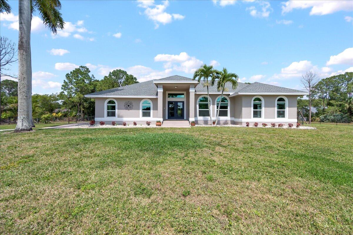 Property for Sale at 14785 74th Street, The Acreage, Palm Beach County, Florida - Bedrooms: 4 
Bathrooms: 2.5  - $799,900