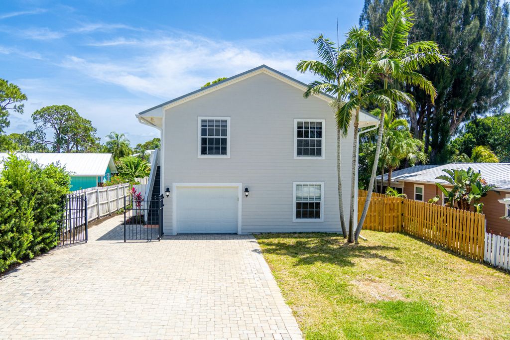 Photo of 1447 SW Peninsula Lane, Palm City, FL 34990 (MLS # RX-11083916)