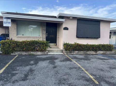 Photo of 126 W Blue Heron Boulevard, Riviera Beach, FL 33404 (MLS # RX-11128894)