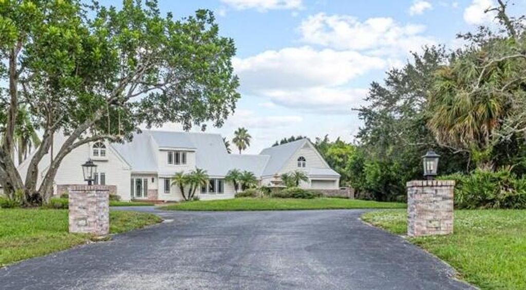 Photo of 1565 SW Saint Andrews Drive, Palm City, FL 34990 (MLS # RX-11119002)