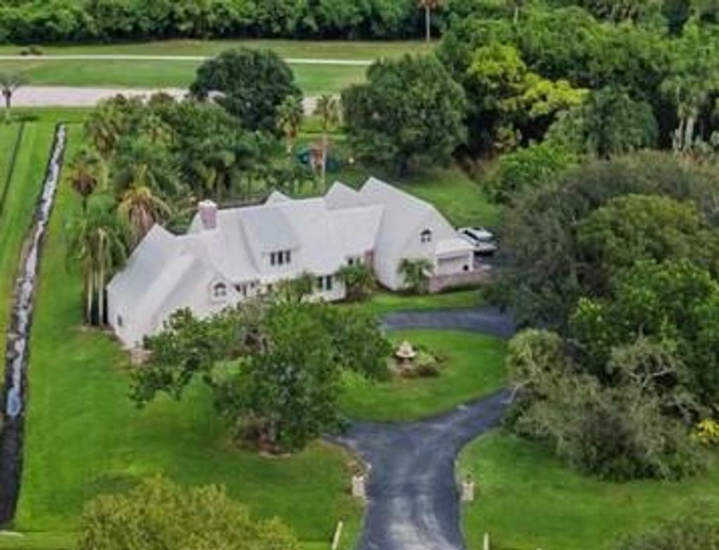 Photo of 1565 SW Saint Andrews Drive, Palm City, FL 34990 (MLS # RX-11119002)