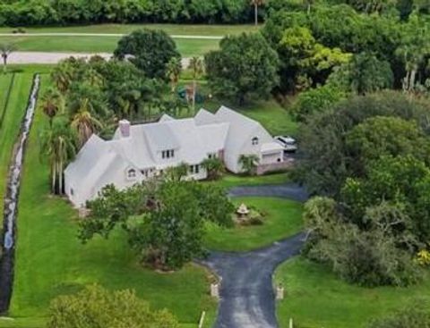 Photo of 1565 SW Saint Andrews Drive, Palm City, FL 34990 (MLS # RX-11119002)