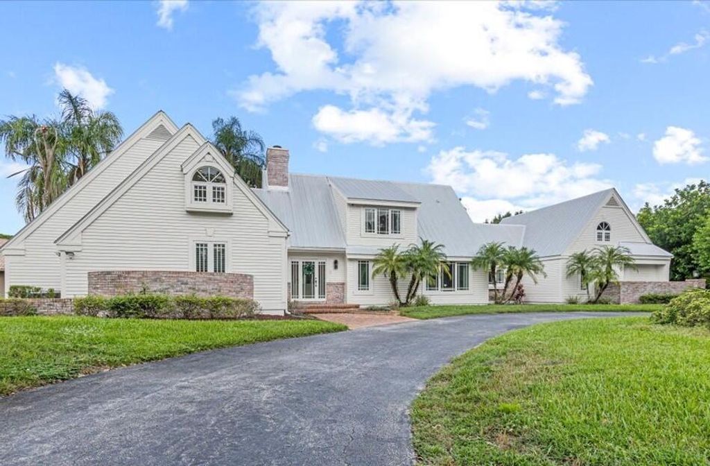 Photo of 1565 SW Saint Andrews Drive, Palm City, FL 34990 (MLS # RX-11119002)