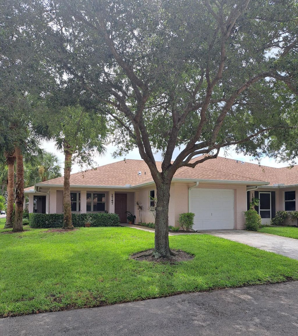 Photo of 1747 N Dovetail Drive #A, Fort Pierce, FL 34982 (MLS # RX-11104941)
