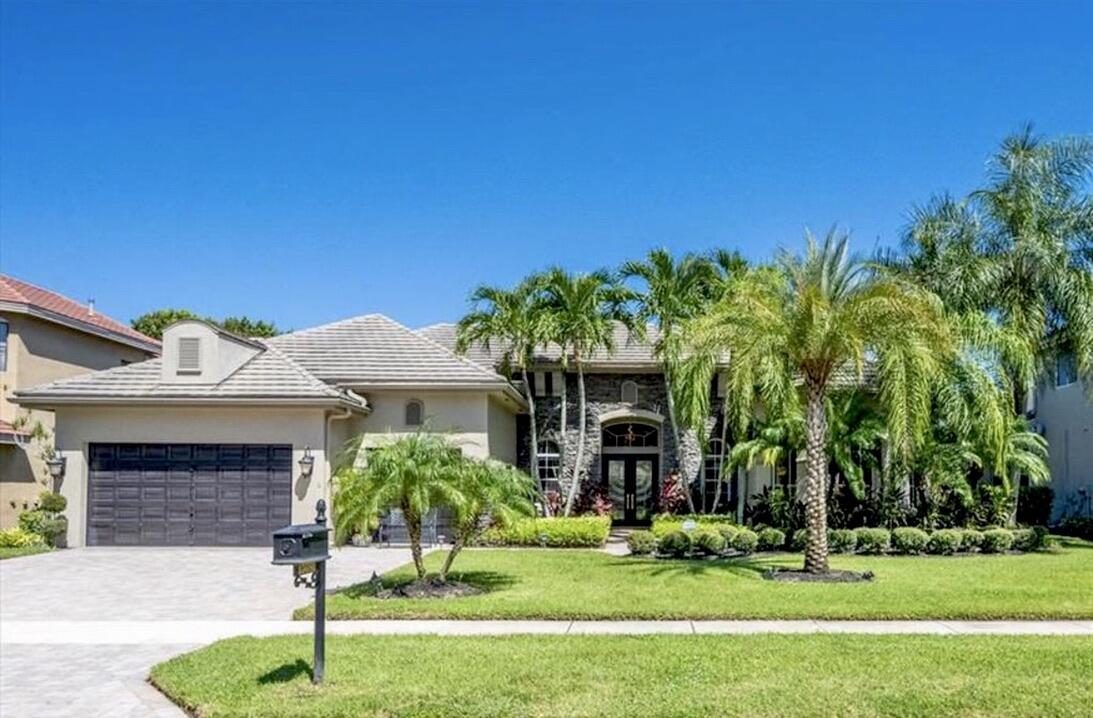 Property for Sale at 10690 Versailles Boulevard, Wellington, Palm Beach County, Florida - Bedrooms: 5 
Bathrooms: 4.5  - $1,250,000
