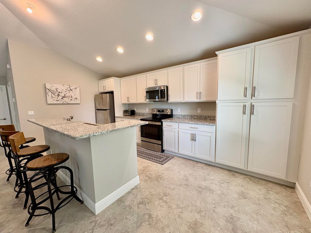 Photo of 713 SE East Avenue, Stuart, FL 34994 (MLS # RX-11098211)