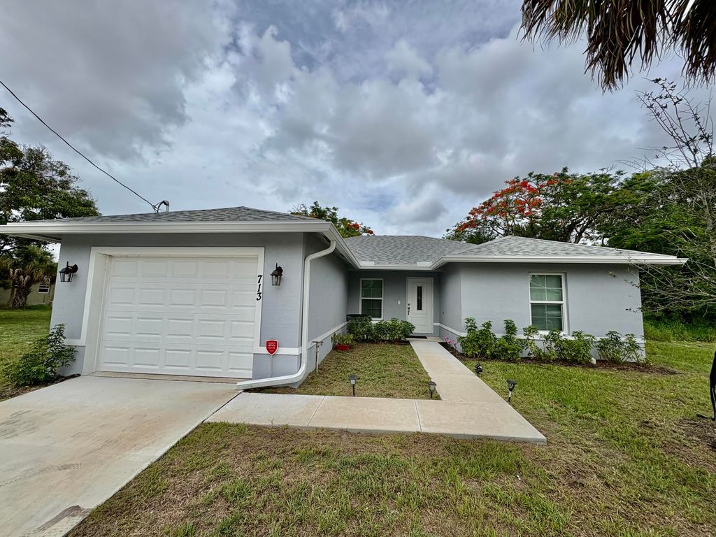 Photo of 713 SE East Avenue, Stuart, FL 34994 (MLS # RX-11098211)