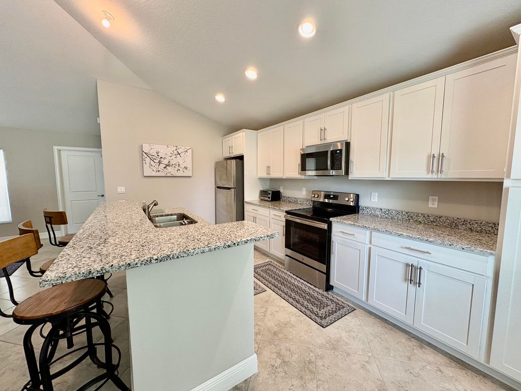 Photo of 713 SE East Avenue, Stuart, FL 34994 (MLS # RX-11098211)