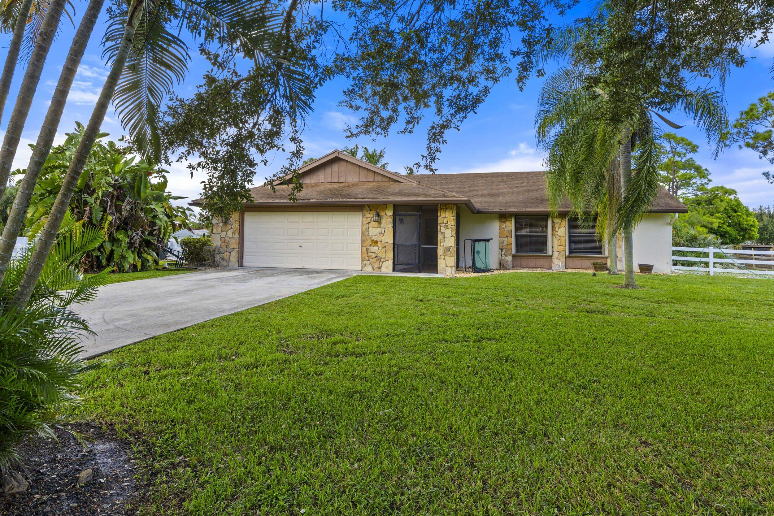 8689 Palomino Drive, Lake Worth, Palm Beach County, Florida - 3 Bedrooms  
2 Bathrooms - 