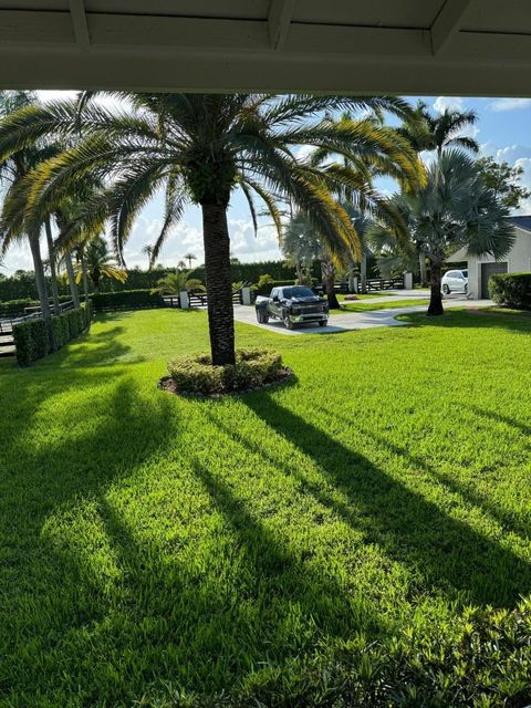 Photo of 5995 130th Avenue S, Wellington, FL 33449 (MLS # RX-11129386)