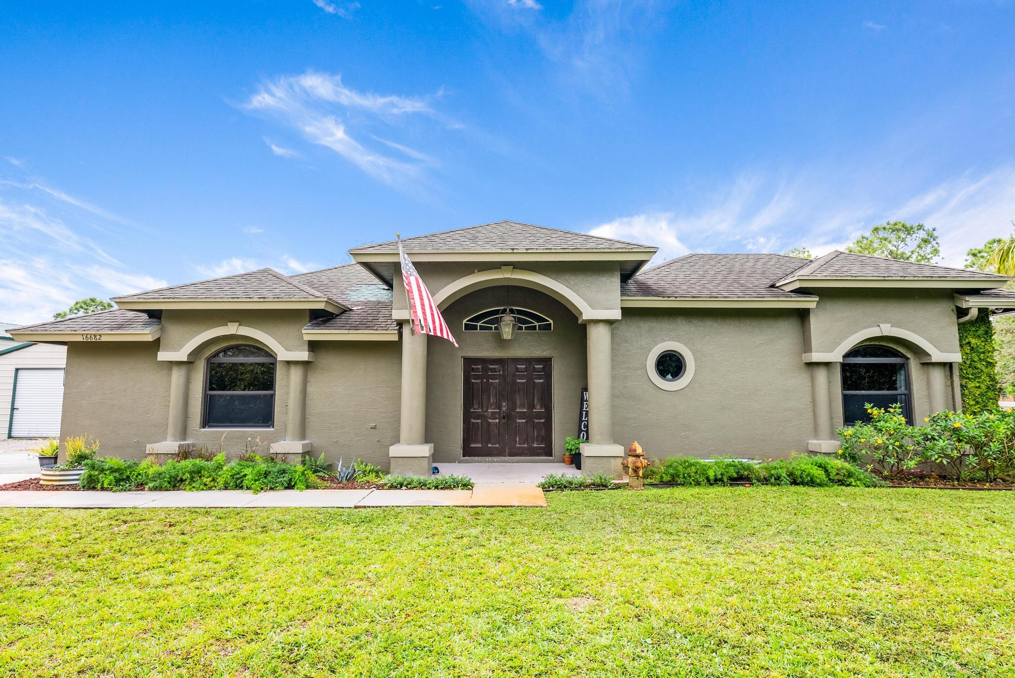 16682 66th Court, The Acreage, Palm Beach County, Florida - 4 Bedrooms  
3 Bathrooms - 