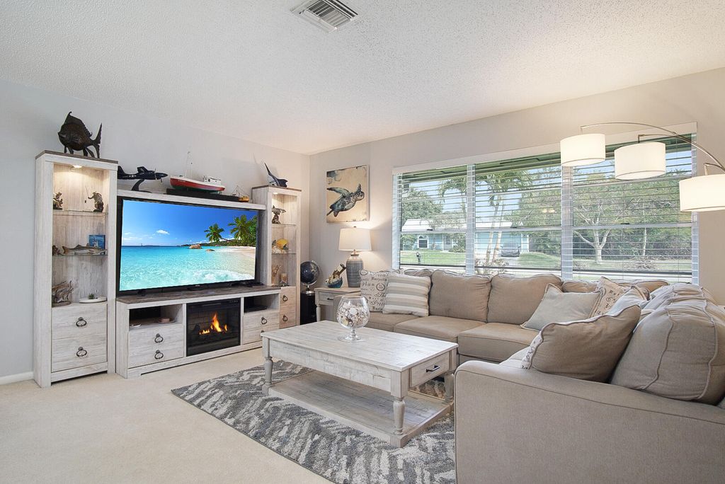 Photo of 5620 SE Paramount Drive, Stuart, FL 34997 (MLS # RX-11084923)