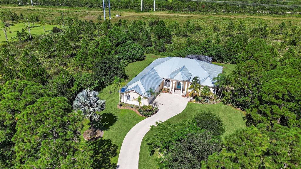 Photo of 7820 SW Saddlebrook Drive, Port Saint Lucie, FL 34986 (MLS # RX-11126061)