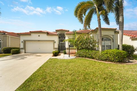 Photo of 8490 Lake Cypress Road, Lake Worth, FL 33467 (MLS # RX-11090631)