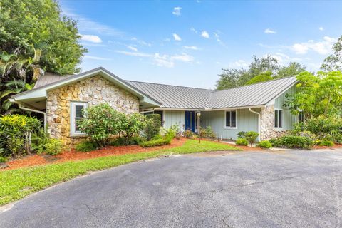 Photo of 1614 SW Saint Andrews Drive, Palm City, FL 34990 (MLS # RX-11114833)