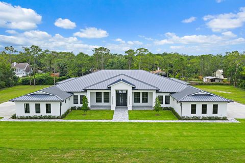Photo of 12850 152nd Street N, Jupiter, FL 33478 (MLS # RX-11110106)
